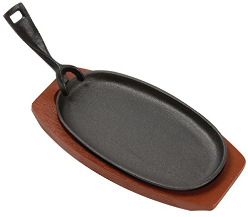 TAMLED Gusseisen Servierpfanne oval mit Untersetzer und Griff ohne Beschichtung