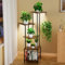 Homsorout Support Plantes avec Lampes de Croissance - 5 Niveaux Porte Plante Interieur, 112cm Étagère Plante en Métal et Bois, Etagere Plante D'intérieur Meuble, Salon et Chambre À Couche (Marron)