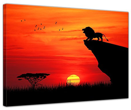 Keilrahmenbild Löwe im Sonnenuntergang - 120x90 cm quer Groß Bilder als Leinwanddruck Fotoleinwand Tierbild Großkatze - Savanne - Löwe auf einem Felsen