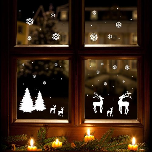 Wandtattoo-Loft Fensterbild „Winterwald“ - mit zauberhaften Rentieren und romantischen Schneeflocken und Sternen/wiederablösbar/Wintermotiv ohne Hintergrundfolie/konturgeschnitten