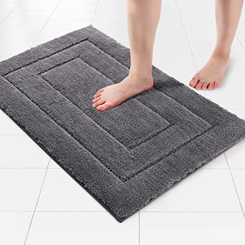 VSUSN Badematte Flauschig, Premium Badteppich, rutschfest Badvorleger, Saugfähig Badezimmerteppich, Bequem,Shaggy,Maschinenwaschbar(Dunkelgrau,60x90cm)