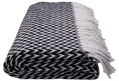 GLAESER Wohndecke Fair Deluxe Cotton All Seasons | Wolldecke aus 50% Baumwolle, 30% Polyester, 20% Acryl | Couchdecke/Sofadecke | Kuscheldecke | Wolldecke mit Fransenborde (Schwarz/Weiß Wellenmuster)
