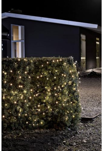 Konstsmide LED Lichterkette, mit an/aus Schalter Lichtsensor und 6h und 9h Timer, 120 bernsteinfarbene Dioden, batteriebetrieben, Außen (IP44), schwarzes Kabel - 3729-800