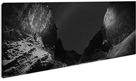 beleuchtete Gesteinsformationen Panorama 60x30 cm Effekt: Schwarz/Weiss als Leinwandbild, Motiv fertig gerahmt auf Echtholzrahmen, Hochwertiger Digitaldruck mit Rahmen