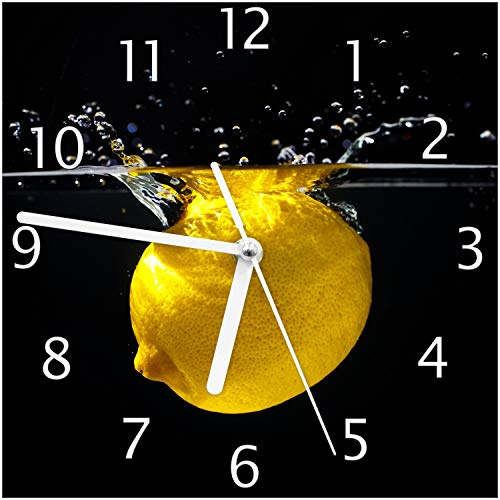 Wallario Design-Wanduhr Zitrone im Wasser - Frisches Obst für die Küche aus Glas, Motiv-Uhr Größe 20 x 20 cm, weiße Zeiger