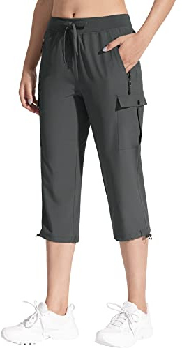 MOCOLY Dam Vandringsbyxor Vattentäta Lätta Snabbtorkande Joggingbyxor Utomhus Andas Casual Träning Sportbyxor Med Fickor Dragkedja UV-skydd, Capri031-gul, S