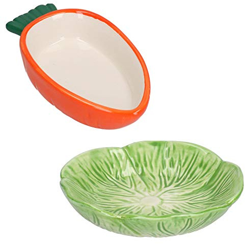 Små djur små sallad gröna blad och morot matningsskål godisgryta