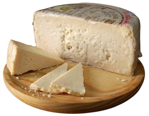 1/2 QUESO ROMERO OCAÑA para paladares exquisitos, graso, mantecoso, con pique, granuloso y quebradizo, color ocre, debido a su larga maduración de hasta 2 años