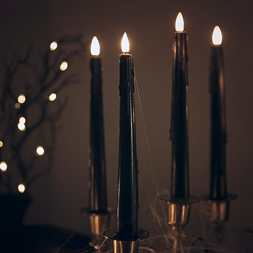Lights4fun 4er Set TruGlow® LED schwarze Stabkerzen mit Fernbedienung Echtwachs Schwarz 24cm Halloween Deko