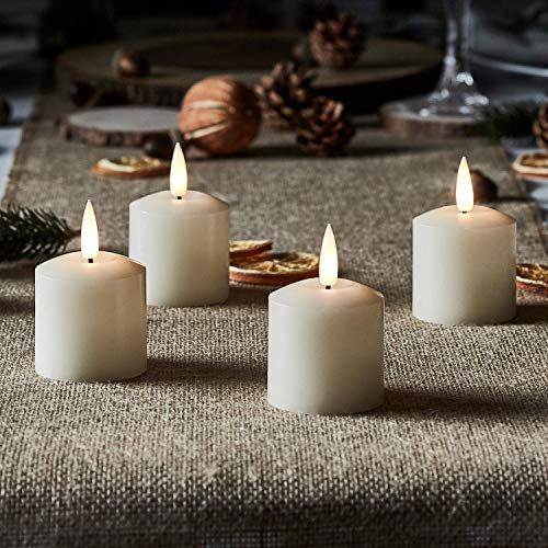 Lights4fun TruGlow® 4er Kerzen Set LED Teelichter mit Timer 5,5 cm Teelichter batteriebetrieben Ostern mit Timerfunktion Echtwachs flackernde Flamme Klein