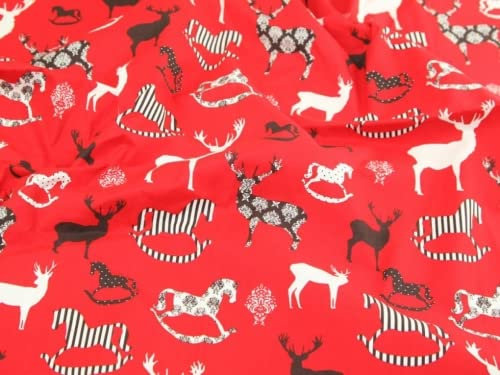 Ciervo y balancín caballos Impresión Navidad algodón tela rojo – por metro