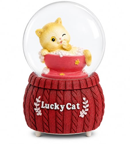 Lucky Cat musikalisk snöglob 100 mm – batteridriven kattprydnad med snöfallseffekt, söt kattunge statyett dekorativ glob JR2616 (röd bas – gul kattunge)