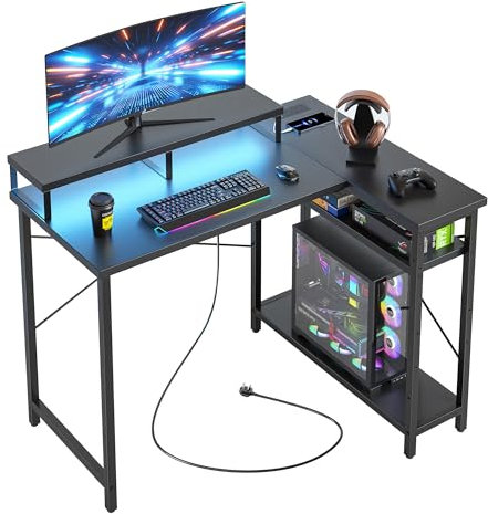 CubiCubi 106.5CM L Shaped Gaming Desk with RGB LED Lights Carbon Fibre Surface, 2 Power Outlets & 2 USB Ports, Reversible Corner Desk with Shelves for Home Office & Small Spaces