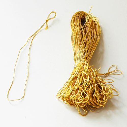 100 elastische Goldkordeln, das goldene Gumiband hat gut 1 mm Durchmesser, etwa 18 cm lang (vom Knoten bis zum Ende der Schlaufe), zum Befestigen von Einlegeblättern in Klappkarten DIN A5 und DIN lang
