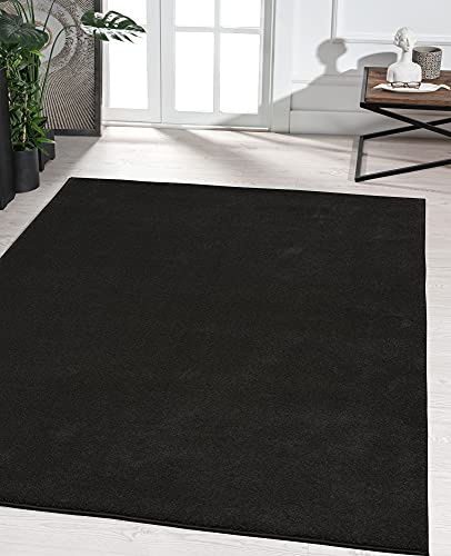 the carpet Marley eleganter Designer Teppich Wohnzimmer, weicher & pflegeleichter Kurzflor Wohnzimmerteppich in Schwarz, Teppich 80 x 150 cm
