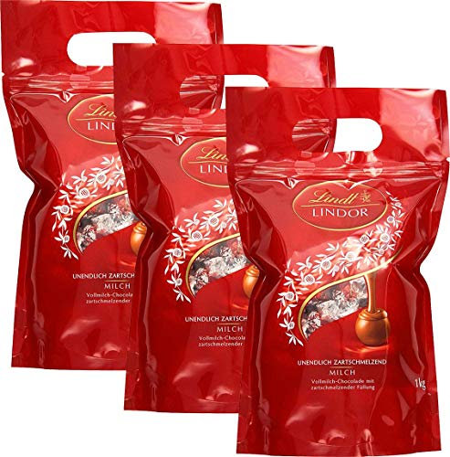 Lindt LINDOR Schokoladen Kugeln Vollmilch | 1 kg Beutel, wiederverschließbar | ca. 80 Schokoladen Kugeln Milch-Schokolade mit zartschmelzender Füllung | Großpackung, Pralinen-Geschenk (3 x 1 kg)
