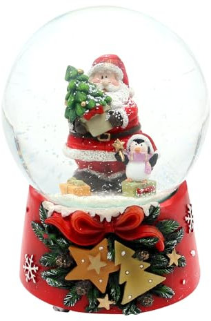 Dekohelden24 Schneekugel Santa mit Pinguin auf weihnachtlichen Sockel mit Spielwerk, Melodie Feliz Navidad, L/B/H/Ø Kugel 10 x 10 x 15 cm Ø 10 cm.
