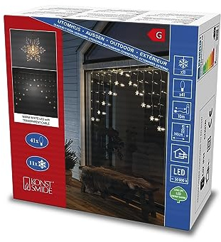 Konstsmide LED Lichtervorhang, 11 klare Schneeflocken, 41 warm weiße Dioden, 4,5V, Außen (IP44), transparentes Kabel - 4048-103