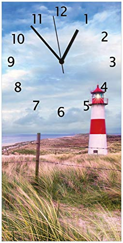 Wallario Design-Wanduhr, Acrylglasuhr Größe 30 x 60 cm, Schwarze Zeiger, Motiv Leuchtturm am Strand von Sylt