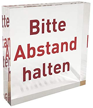 PLEXIGLAS® Block als glasklarer Hinweis-Aufsteller/Infoständer mit rotem Hinweis Aufdruck „Bitte Abstand halten“