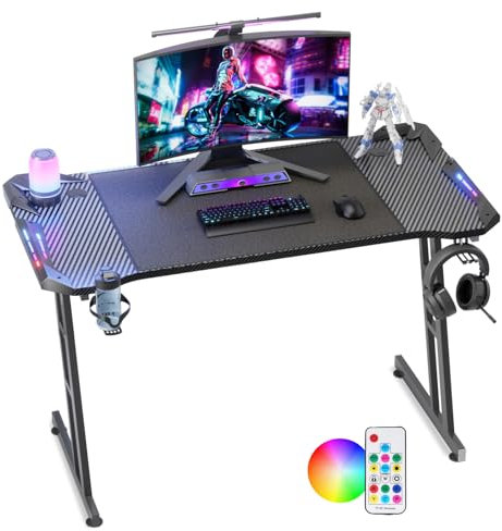 Soontrans Mesa Gaming LED Escritorio Gaming Ergonomico Mesa Gamer Grande Mesas Ordenador de Fibra de Carbono con Portavasos y Gancho para Auriculares 140x 60 x 73 cm