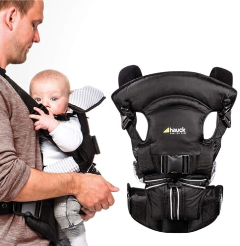 hauck 4 Way Carrier Ergonomische Babytrage 4 in 1 inkl. Kopf und Nackenstütze, Vier Tragemöglichkeiten ab Geburt bis zu 12 kg - Schwarz