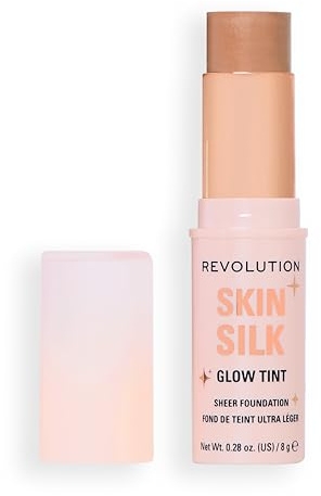Revolution Skin Silk Glow Tint Barra de Base Ligera – Piel Radiante, Disimula Imperfecciones y Suaviza Líneas Finas, Tono Medium Tan Neutral, 8g