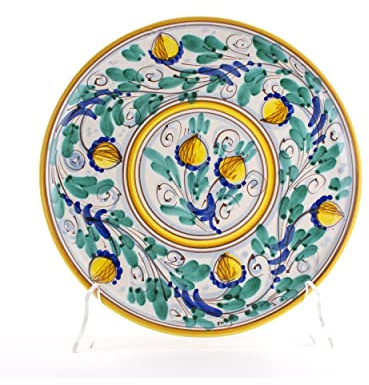 Plato artesanal mural ornamental Ø 25 cm de cerámica italiana siciliana de Caltagirone decorada y hecha a mano.