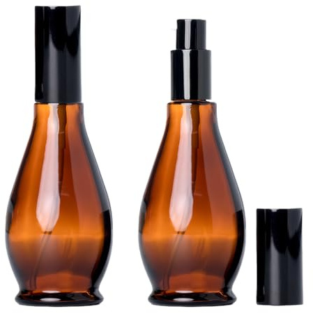 UPSTORE 2 botellas de cristal ámbar de 100 ml con dispensador de bomba de viaje con bomba negra para aceites esenciales, base, crema, champú, 2 unidades