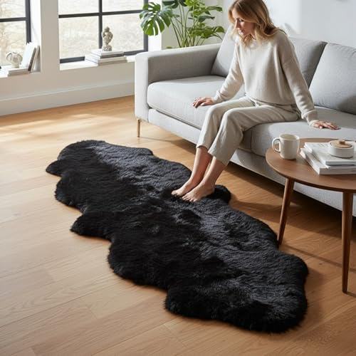 Infinity Leather Alfombra de Piel de Oveja de Lujo, 100% Lana Real Natural, Suave, Sedosa y esponjosa. Manta para Dormitorio, sofá o Suelo Muy cálida, Transpirable y Decorativa (180 x 60 cm) (Negro)