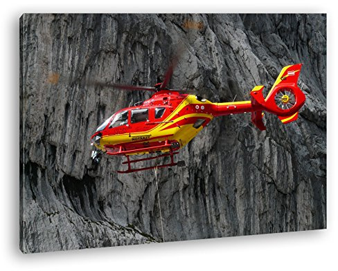 Leinwandbild Rettungshubschrauber im Einsatz, schnell und mutig Format: 60x40 cm XXL Kunstdruck Bild auf Keilrahmen/Wandbild/Wohnzimmer Deko