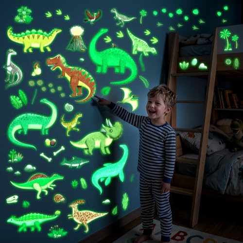 DECOWALL Dinosaurier Leuchtsticker Nachtleuchtend Kinderzimmer (GDS4-8087) | 4 Bögen mit T-Rex, Triceratops, Stegosaurus, Fußspuren & Pflanzen – farbenfrohe Urzeitmotive für Schlafzimmer und Spielzimmer
