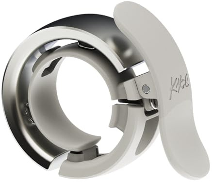 Knog Oi Prima Bike Bell – Loud 80dB Ring, Wrap-Around Design, WAVETEK Hammer, Durable Build, Easy Install – Two Sizes to Ensure Correct Fit.