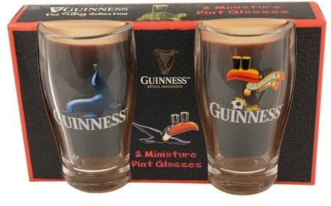 Guinness Mini vasos de pinta de 2 unidades, diseño de tucán de foca y fútbol, producto oficial, juego de vasos de chupito coleccionables