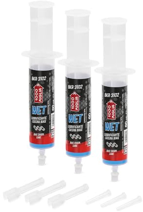 1000 Miglia BKR 3102 Lubricante Cadena Bicicletas WET - 180 ml(3 x 60 ml), uso Condiciones terreno Húmedo, Mojado y Embarrado, Jeringa aplicadores Drop y Huggie System, fórmula fluorescente perfumada