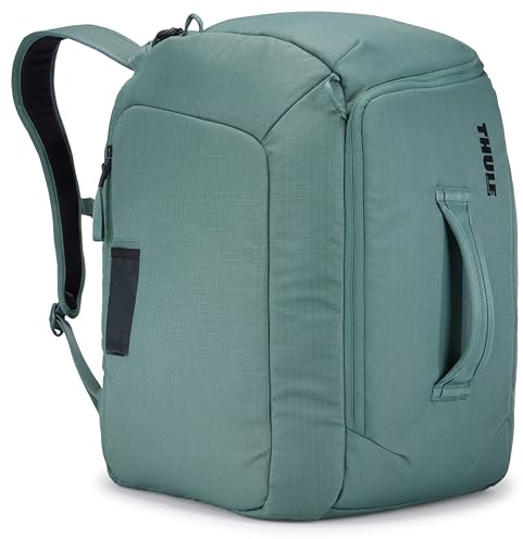 Thule RoundTrip 45L Boot Backpack - Storage compartments to organize and protect gear - Boot bag for ski and snowboard travel - Soft pocket for goggles and helmet - Built in standing pad