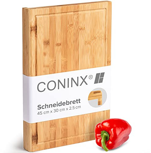 Coninx Schneidebrett Holz groß mit Saftrille - Antibakterielles Moso Bambus Holzbrett zum Schneiden von Gemüse, Obst, Käse, Fleisch & mehr - Robustes Holz Küchenbrett - Servierbrett 45x30x2.5cm