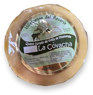 Queso curado de Oveja Artesano La Covacha, envuelto en Aceite de Oliva: Una joya gastronómica que captura la esencia de la Sierra de Grazalema. Descubre un sabor auténtico en cada bocado.(2KG APROX)