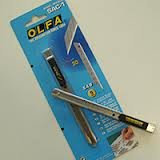 Cortador de metal Olfa para láminas y rótulos y adhesivos de pared.