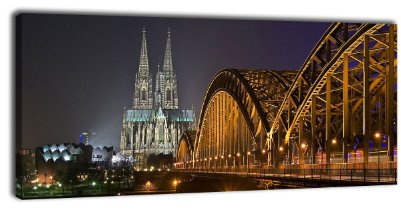 wandmotiv24 Leinwandbild Panorama Nr. 251 Kölner Dom bei Nacht 100x40cm, Keilrahmenbild, Bild auf Leinwand, Köln Rhein Dom