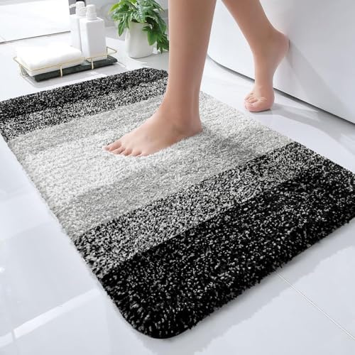 OLANLY Badrumsmatta 61 x 40,6 cm i extra mjuk och absorberande mikrofiber - gummibaksida - snabbtorkande - maskintvättbar - för badrumsgolv, badkar, dusch och | Svart, halkfri snabbtorkande gummibaksida, tvättbar plyschbadmatta för golv, badkar och dusch, heminredningstillbehör