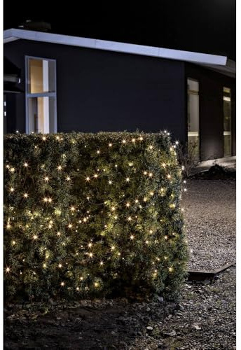 Konstsmide LED Lichterkette, mit an/aus Schalter, Lichtsensor, 6h und 9h Timer, 20 bernsteinfarbene Dioden, batteriebetrieben, Außen (IP44), schwarzes Kabel, schwarze Box - 3722-800