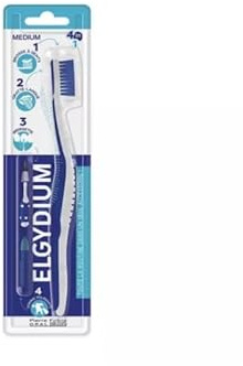 Elgydium 4 IN 1 Cepillo de dientes MEDIUM + raspador de lengua, cepillo interdental y goma pulidora antimanchas