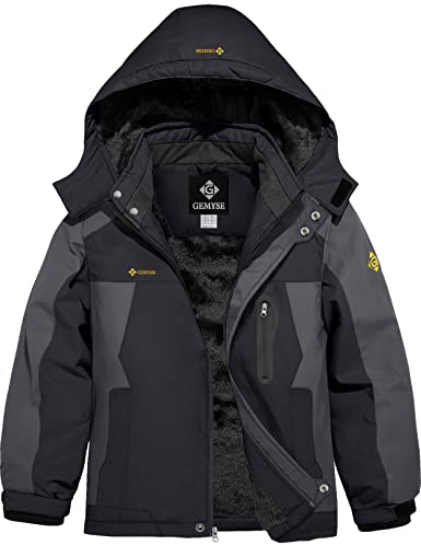 GEMYSE Chaqueta de Esquí para Niño Abrigo de Nieve Invierno Cortaviento con Capucha y Forro Acolchado(Negro y Gris Hierro,128-134)