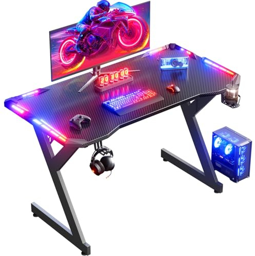 HLFURNIEU LED Mesa Gaming 100 x 60 cm, Escritorio Gaming Ergonómica de Superficie de Fibra de Carbono, Mesa Ordenador con Portavasos y Gancho para Auriculares, Escritorio Gamer Negro