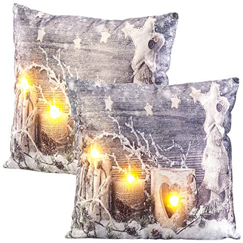 infactory Glow-Kissen: 2er-Set Deko-Kissen mit Wintermotiv, 3 LEDs, Batteriebetrieb, 45x45 cm (Deko mit LED Lichtern, Weihnachtskissen, Bild)