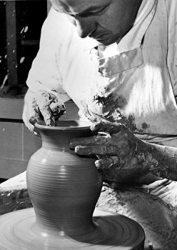 Potter working on a pottery wheel Poster Print (18 x 24)