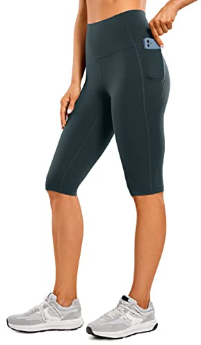 CRZ YOGA Dam Butterluxe Capri träningsleggings – 33 cm hög midja knälång yoga löpning cykling leggings med fickor, Skog mörkgrön, 38 SE