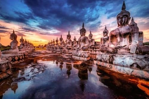Holz-Bild 50 x 30 cm: Viele Buddha-Statuenbilder bei Sonnenuntergang im Süden Thailands (188187856)