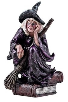 DRW Figura Bruja sentada en un Libro con Escoba de Resina Pintada a Mano 13 cm